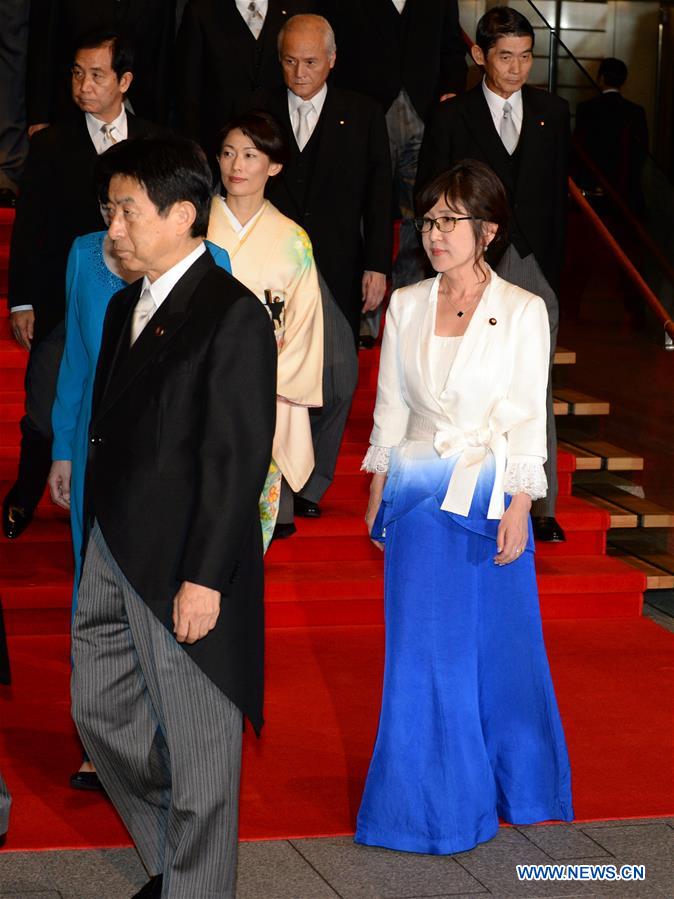 Abe picks hawkish defense minister in reshuffle