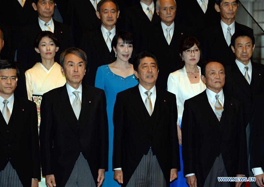 Abe picks hawkish defense minister in reshuffle