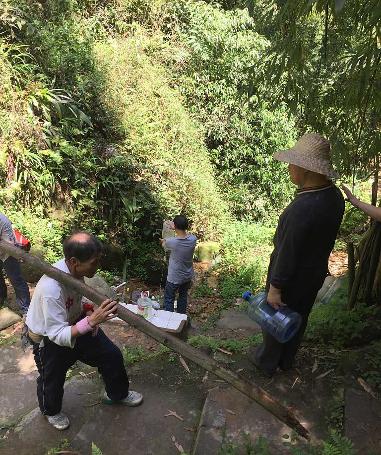   In 2012, Zhang Jiwen and his wife began building roads in